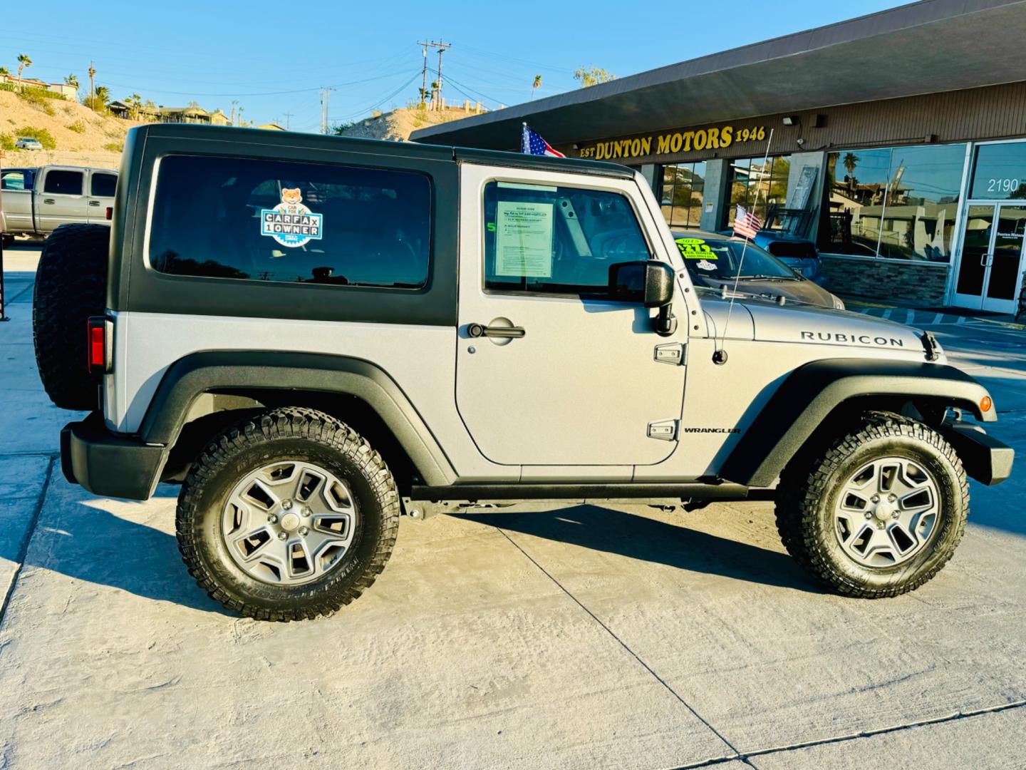 2015 Silver /black Jeep Wrangler (1C4BJWCG3FL) , located at 2190 Hwy 95, Bullhead City, AZ, 86442, (928) 704-0060, 0.000000, 0.000000 - 2015 Jeep wrangler Rubicon. automatic hard top. only 15545 miles. *1 owner. super super clean. always garaged. local jeep. free and clear title. has brackets in front to tow behind. - Photo#9